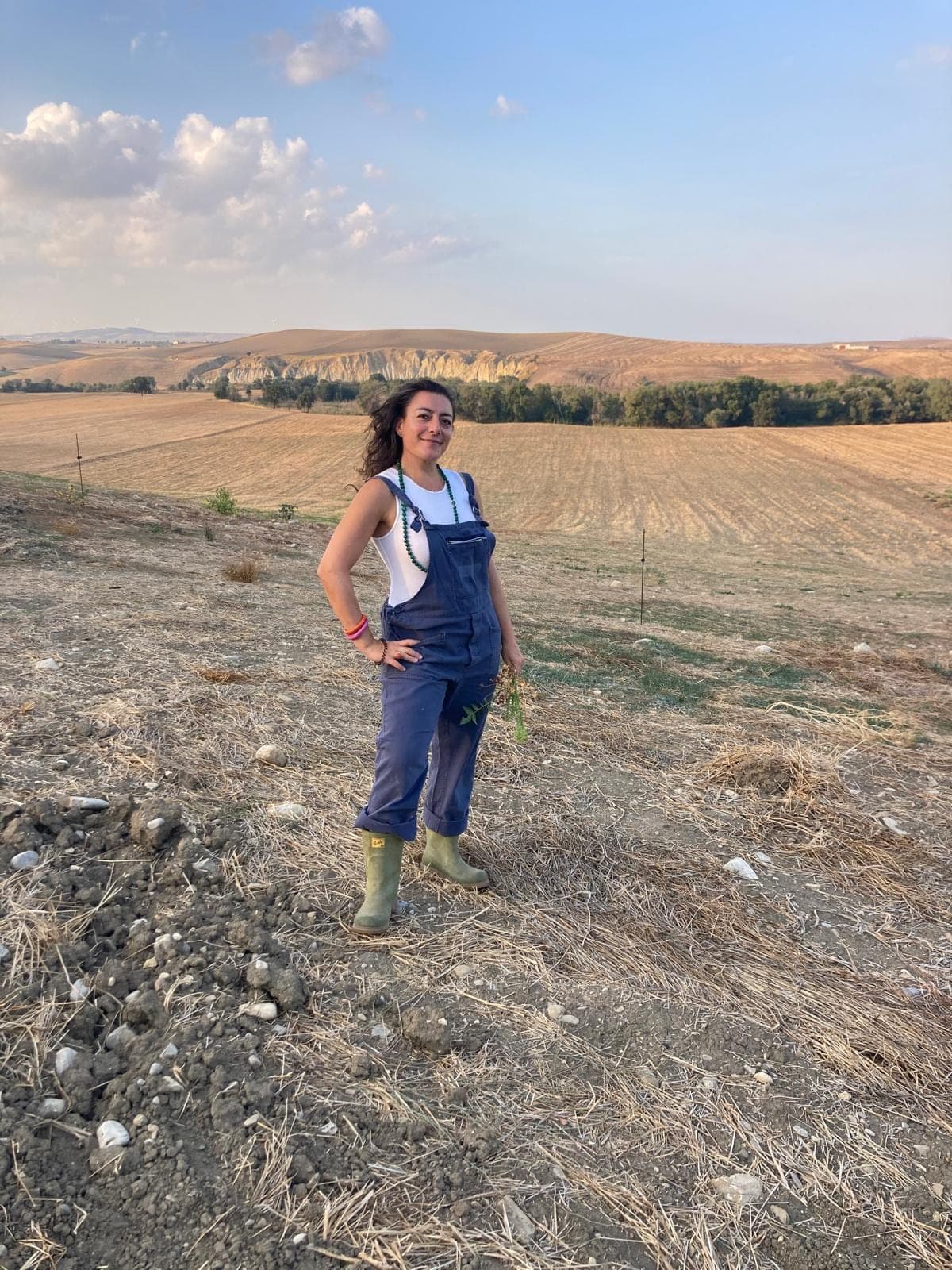 Standing on the estate above the harvested fields and clay hills